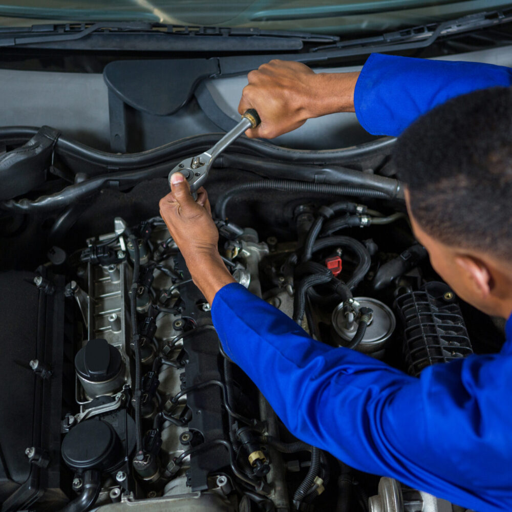 Mechanic servicing a car at repair garage